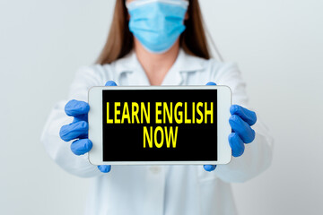 Poster - Handwriting text Learn English Now. Conceptual photo gain or acquire knowledge and skill of English language Laboratory technician featuring empty sticker paper accessories smartphone