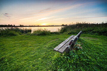 Sticker - Wooden bench for hikers near a lake