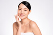 © kitthanes  - Beautiful young asian woman with clean fresh skin on white background, Face care, Facial treatment, Cosmetology, beauty and spa, Asian women portrait