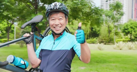 Wall Mural - old man holding a bicycle