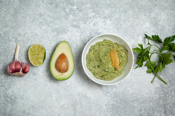 Wall Mural - guacomole in a white bowl