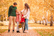 © travnikovstudio - Portrait of happy family of four in autumn day