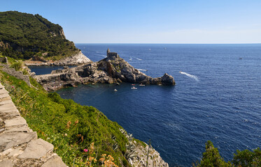 Poster - Elevated view of the Gulf of Poets with the ancient Church of St Peter on the promontory and the Palmaria Island in the background in summer, Porto Venere, La Spezia, Liguria, Italy