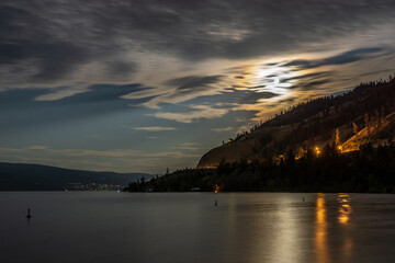 Wall Mural - cloudy sky seen from the shore of Okanagan lake at night British Columbia Canada