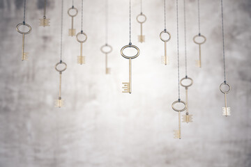 Poster - Gold keys on rope on blurry concrete wall background.