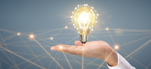 Hand of holding light bulb. idea innovation inspiration concept