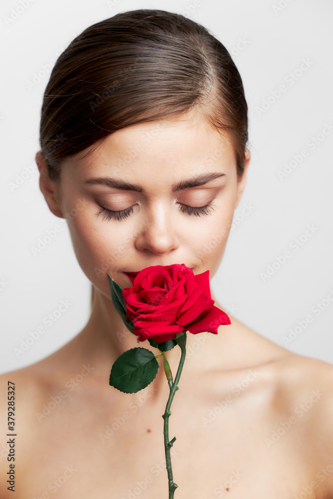 Attractive woman eyes closed sniffing a rose red lips Stock Photo ...