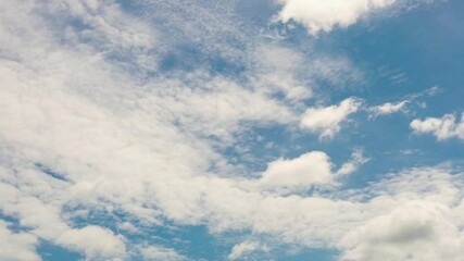 Wall Mural - timelapse of blue sky and moving white clouds during summer season weather for natural concept