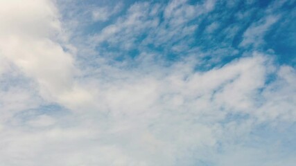 Wall Mural - timelapse of blue sky and moving white clouds during summer season weather for natural concept