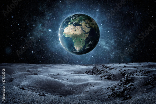 Fotomural Planet earth seen fron the moon surface with copy space