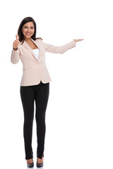 Wall Mural - Positive businesswoman gesturing ok and inviting, smiling