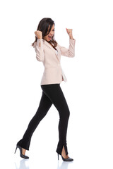 Wall Mural - Celebrating businesswoman shouting with fists clenched