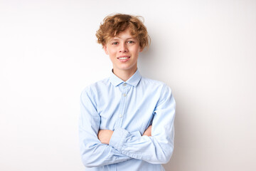 portrait of smiling young boy 14 years old isolated over white background, look at camera. youth con