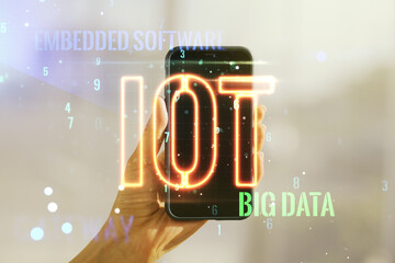 Poster - Double exposure of creative IOT hologram and hand with cell phone on background, research and development concept