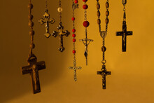 Many Holy Jesus Crosses Hang Next To Each Other