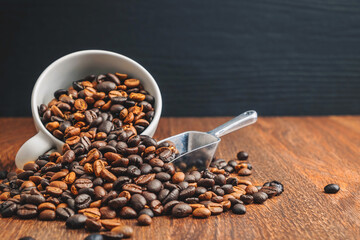 Roasted coffee beans on a wooden table