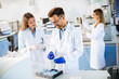 © BGStock72 - Group of young researchers analyzing chemical data in the laboratory