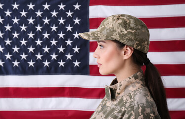 Wall Mural - Female soldier in uniform against United states of America flag