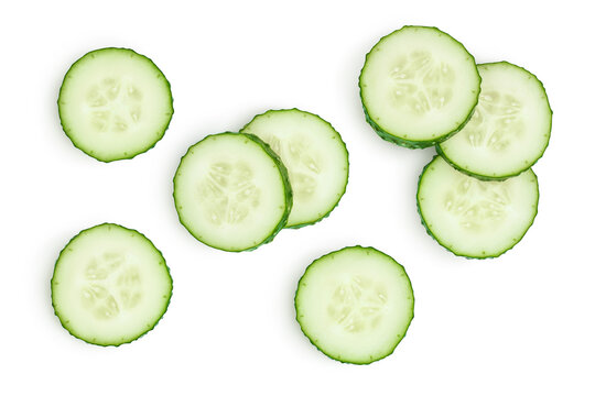 sliced cucumber isolated on white background with clipping path and full depth of field, top view. f