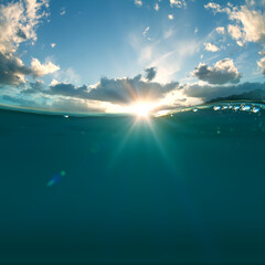 Wall Mural - sky and sea water divided by waterline. ocean aquatic nature design. tropical shining waters