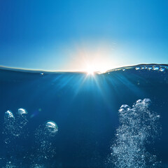 Wall Mural - sky and sea water divided by waterline. ocean aquatic nature design. tropical shining waters