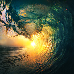 Fototapete - The Sun inside A barrel of Colorful Ocean Wave