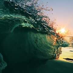 Fototapete - Bright Sun Lit A barrel of Colorful Ocean Wave