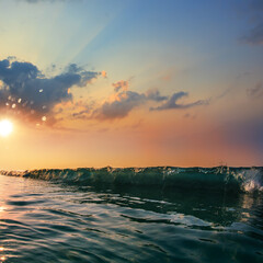 Fototapete - Beautiful sunset at the sea with long wave