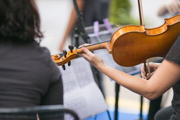 string orchestra playing a concert