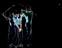 One Caucasian Young Golfer Man Golfing Golf Swing Isolated On Black Background With Multiple Exposure