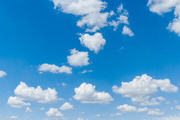 Wall Mural - blue clear sky with white fluffy clouds. natural background