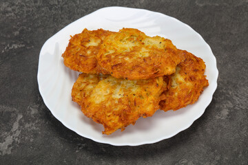 Canvas Print - Roasted potato pancakes in the bowl