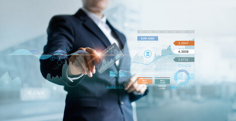 Fototapete - Businessman holding credit card with online banking and payment, finance and currency exchange data on network, Online shopping and cyber security, Business technology.