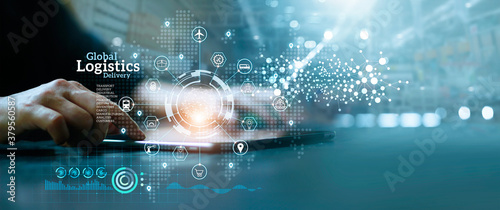 Fotografía Businessman analyzing business growth global logistics network distribution and transportation successful on industrial container cargo background