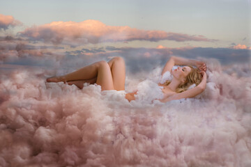 Girl sleeping in the clouds.