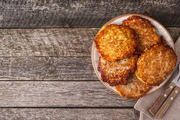 Wall Mural - Potato pancakes on rustic style. Draniki. Top view