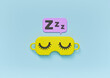 © FOTOSPLASH - cartoon style sleeping eye mask. minimal sleep icon, sign, symbol concept. 3d rendering