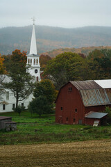 Canvas Print - Rustic farm scene in rural vermont during autumn with fall colors changing and a bountiful harvest and a traditional American scene depicting home for the holidays