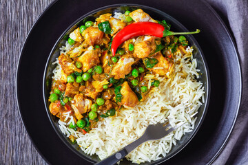 Wall Mural - fish curry with green peas in a bowl