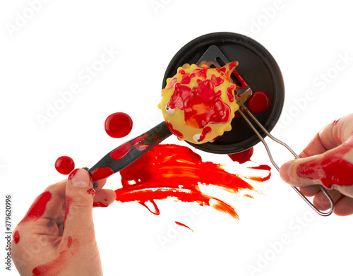 Fotomural Child cooks a bleeding toy fish in a pan