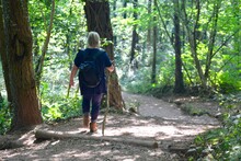 Mature Woman Walking In The Welsh Countryside Alone, Covid Safe, Socially Distanced, Healthy Leisure Activity In Fresh Air. The New Normal, Mountain / Hill Walking Trekking In Abergavenny Wales