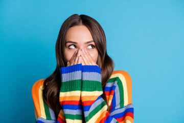 Poster - Close up photo of cute sweet pretty girl close cover her mouth face hands look copyspace wear season winter clothes isolated over blue color background