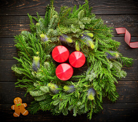 Sticker - Christmas wreath on dark wooden background