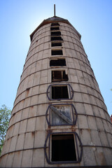 Sticker - Vertical low angle shot of an old abandoned tower