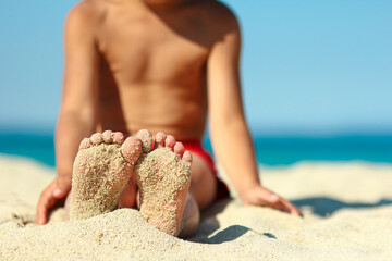 foot of  Little child on the beach seashore