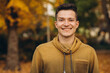 © anatoliycherkas - Portrait of handsome guy smiling in the autumn park