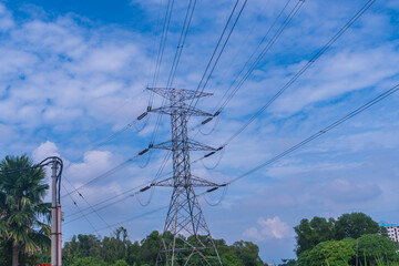 high voltage cable with blue sky and cloud background