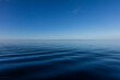 © Song Heming/Stocksy - sea surface and blue sky in the morning