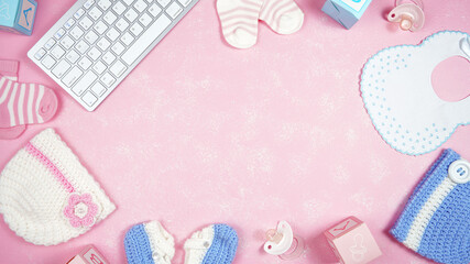Wall Mural - Baby nursery clothing mom bloggers desktop workspace with pink and blue accessories on stylish pink textured background. Top view blog hero header creative composition flat lay. Negative copy space.