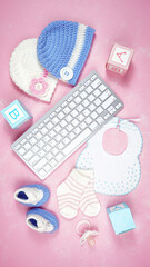 Wall Mural - Baby nursery clothing mom bloggers desktop workspace with pink and blue accessories on stylish pink textured background. Top view blog hero header creative composition flat lay.